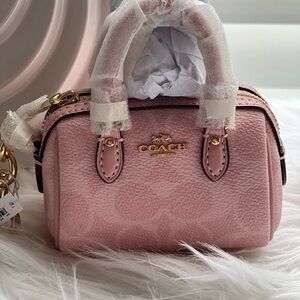 NWT COACH Mini Rowan Bag Charm In Signature Canvas CX068 Powder Pink